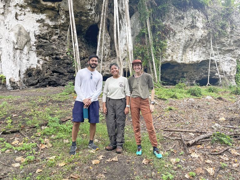 Photo of John I. Borja, Marybelle Quinata, and Emily Sesno outdoors